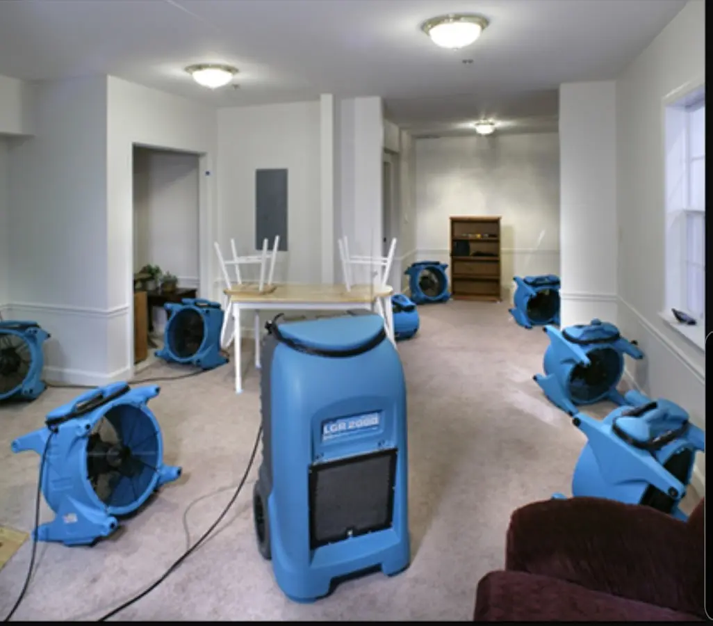 Air movers and dehumidifier setup for Water Damage Restoration in Layhill